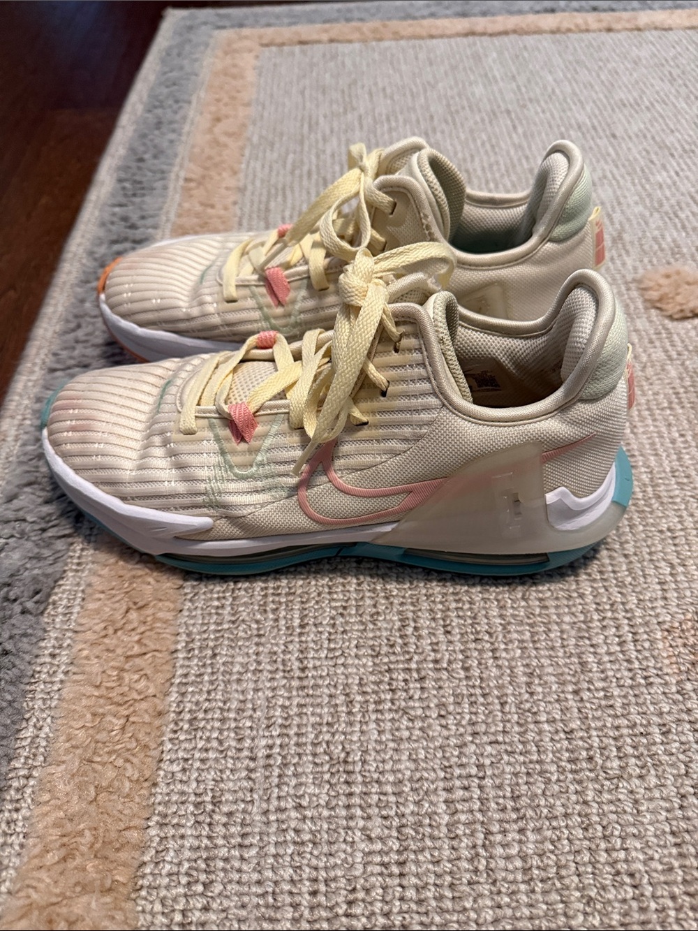 Nike Cream Running Shoes with Pink, Yellow and Teal Accents